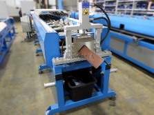 Rake trim roll forming machine
