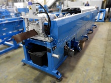 Rake trim roll forming machine