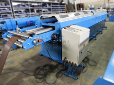 Rake trim roll forming machine